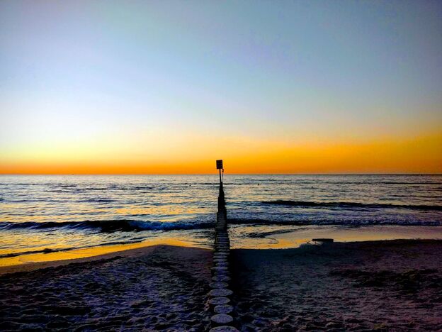 Strand im Sonnenuntergang in Kolberg Strand im Sonnenuntergang in Kolberg